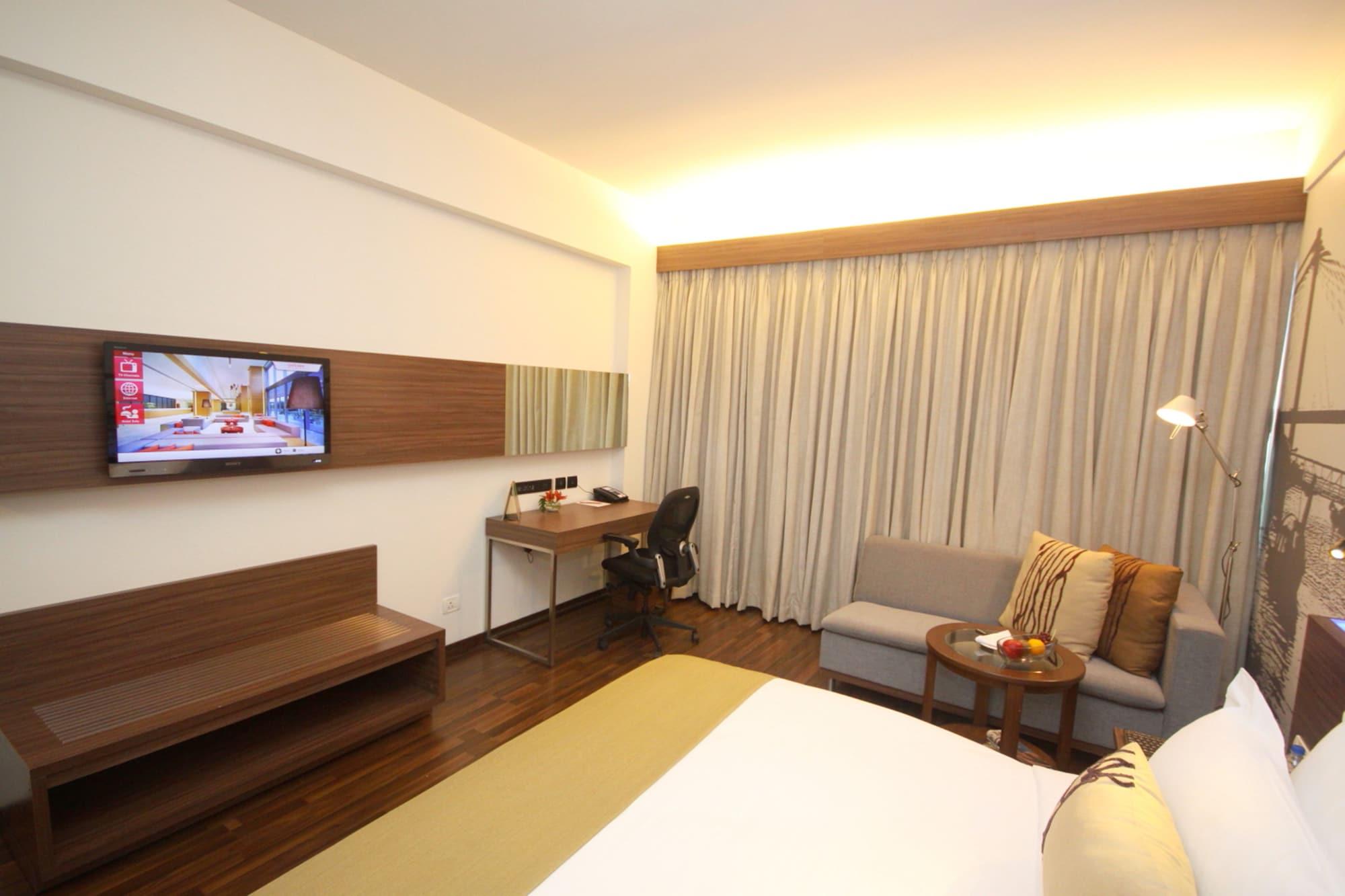 Vivanta Kolkata Em Bypass Esterno foto A room at the hotel
