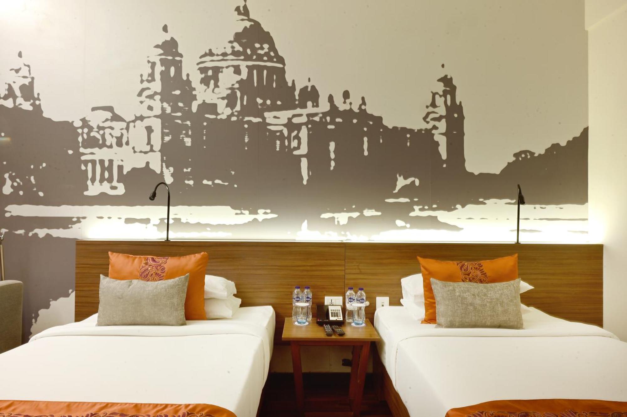 Vivanta Kolkata Em Bypass Esterno foto A room at the hotel