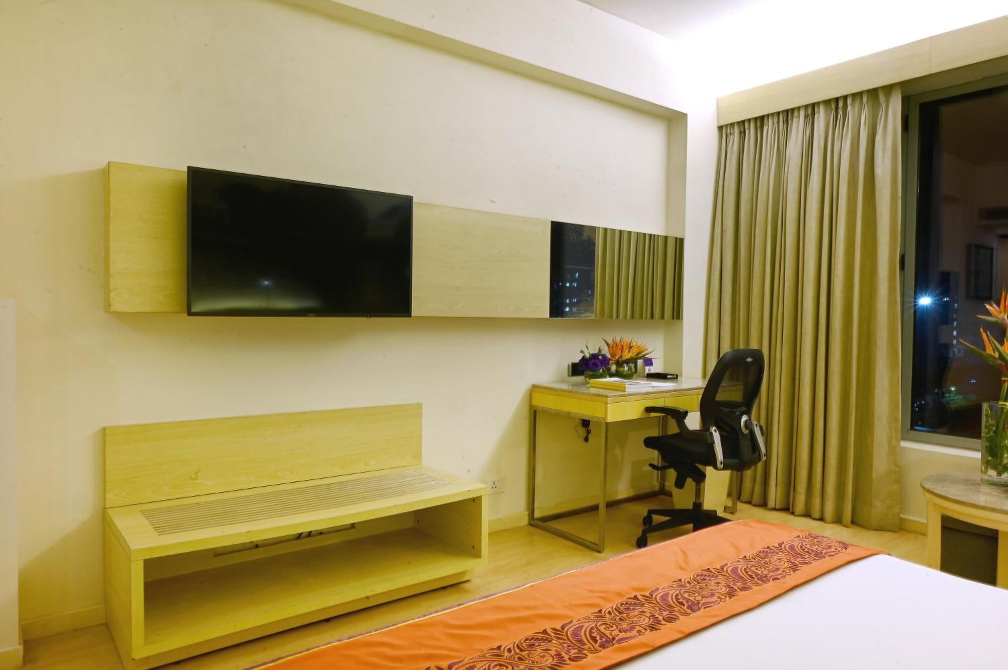 Vivanta Kolkata Em Bypass Esterno foto A room at the hotel