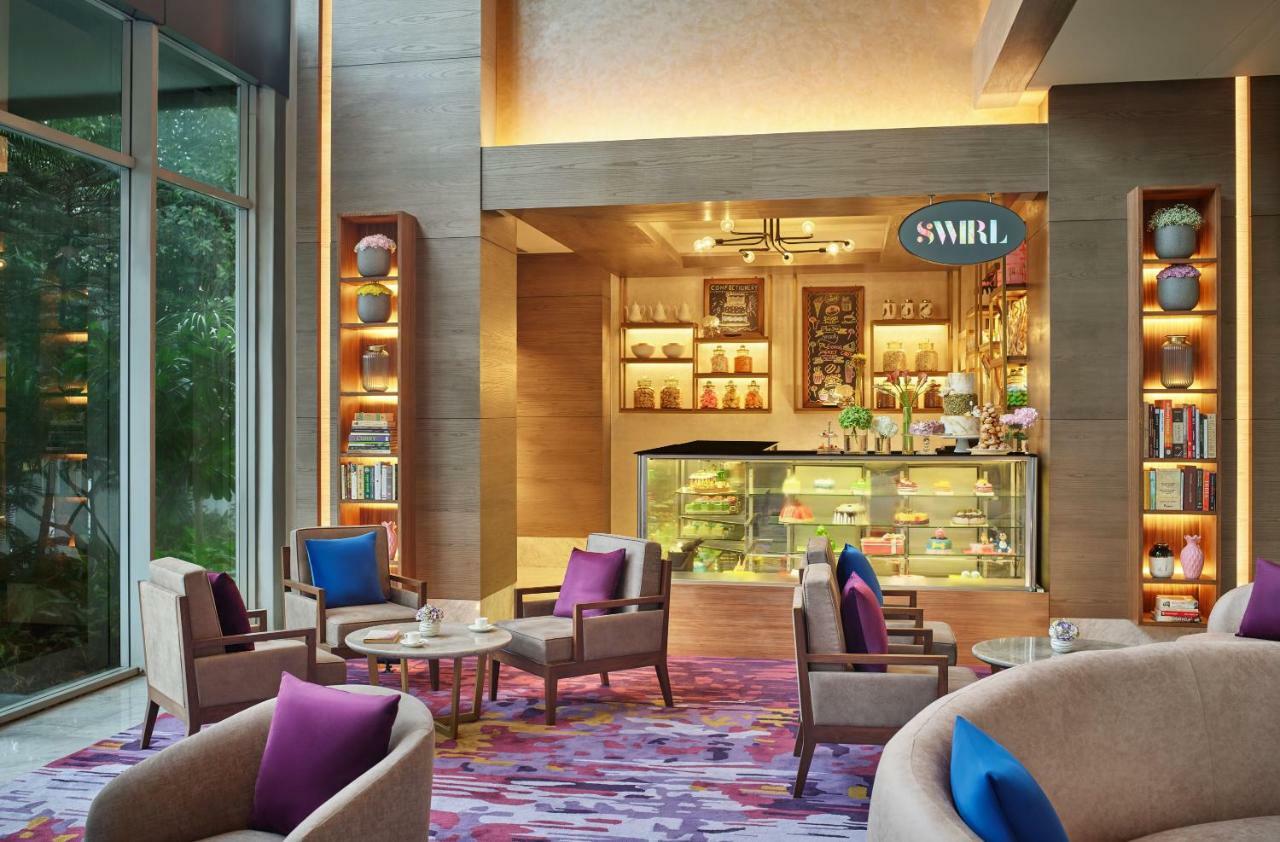 Vivanta Kolkata Em Bypass Esterno foto The Swirl Lounge at the airport